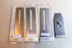 104  (2) New Hock 2” Plane Blades, A-2, and HC steel, (1) New Hock1 3/4” A-2 cryo, & used chip braker